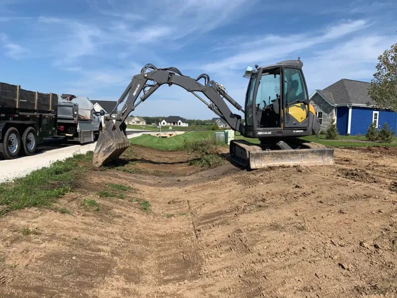 Site grading and swale work — new subdivision